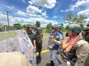 AOT tour border at occupied Chouk Chey village